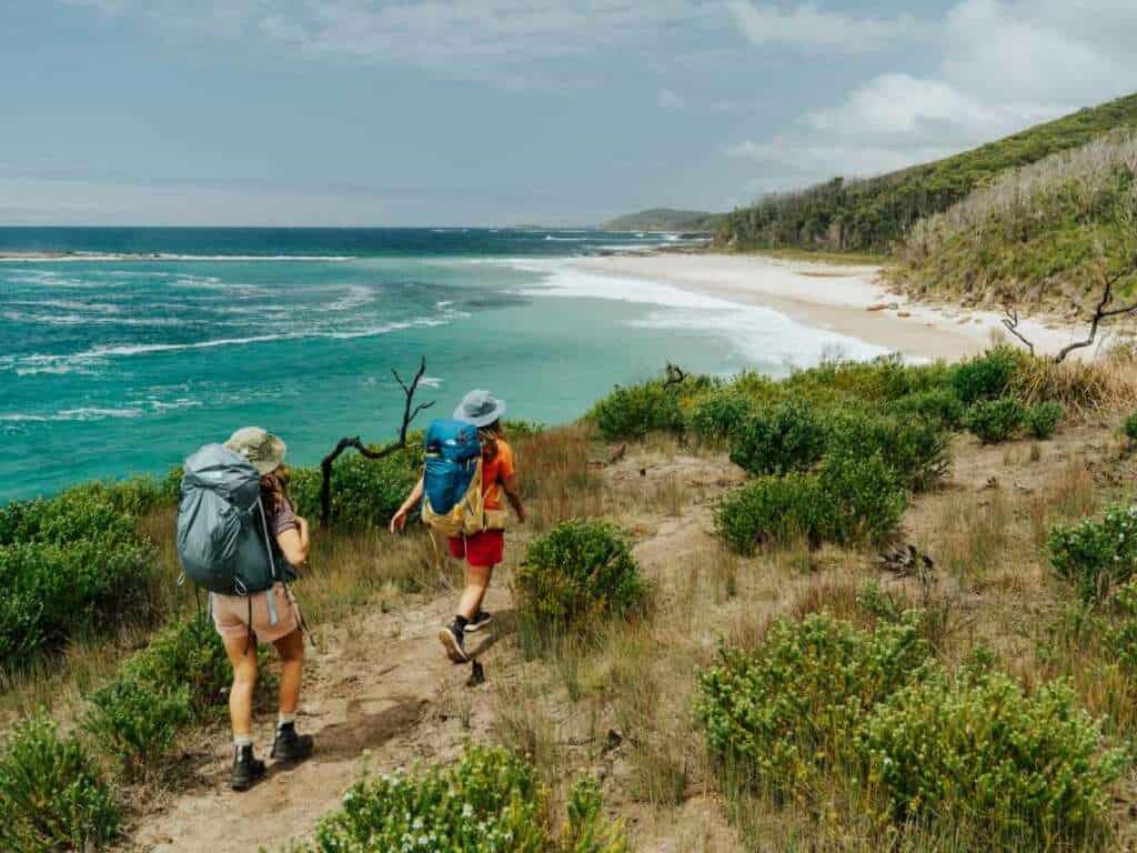 Hikers on the Murramarang South Coast Walk near Pebbly Beach